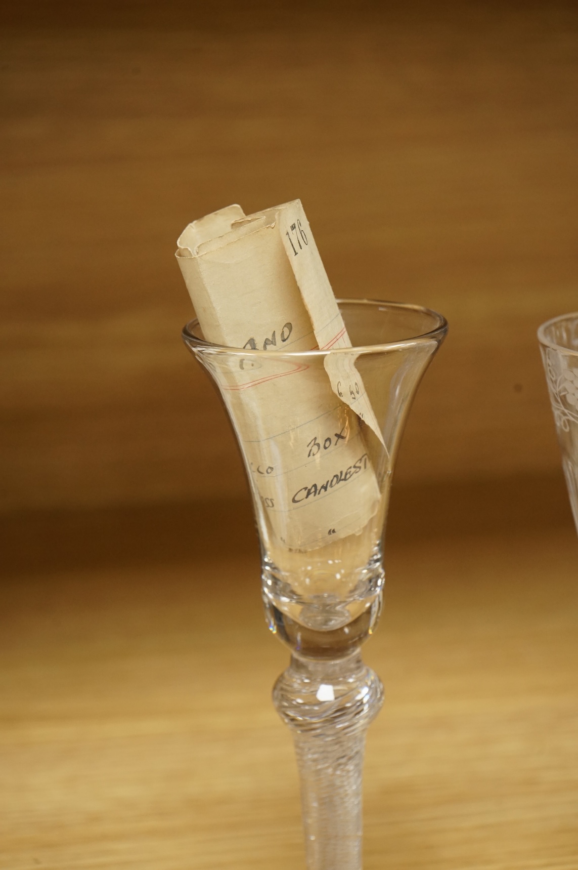 Two Georgian wine glasses, one with air twist stem and etched decoration to the bowl, largest 16cm high